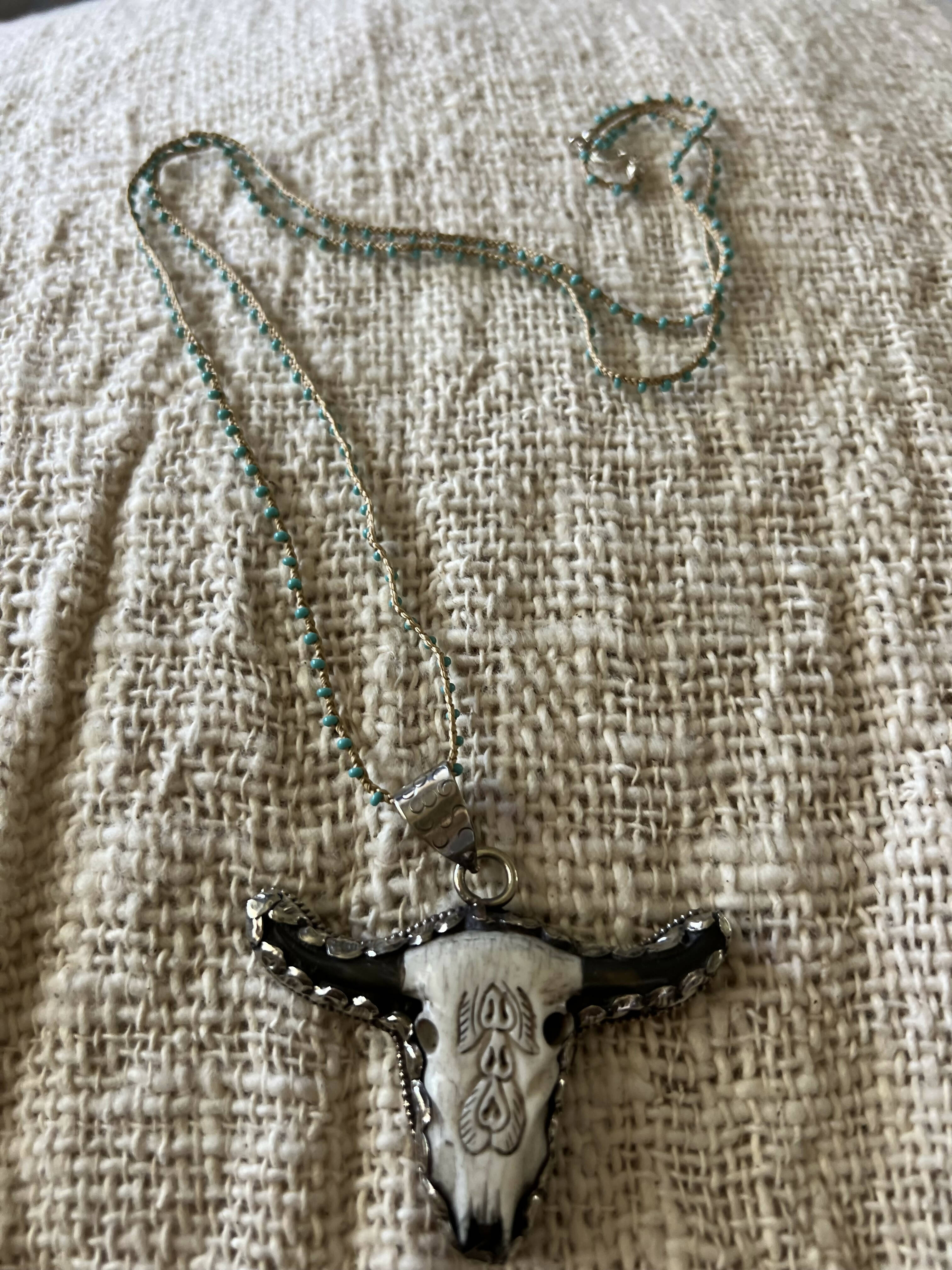 Handmade south western yak bone skull necklace